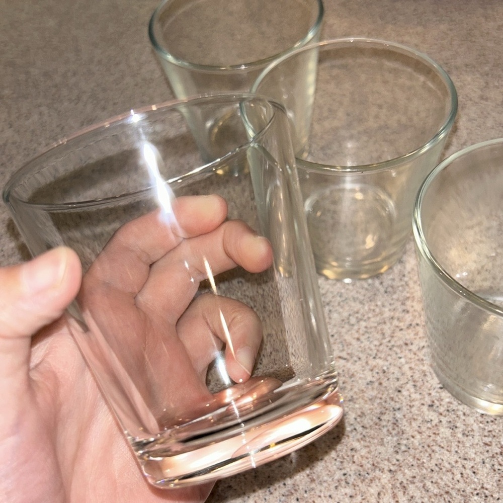 Four small water bottles